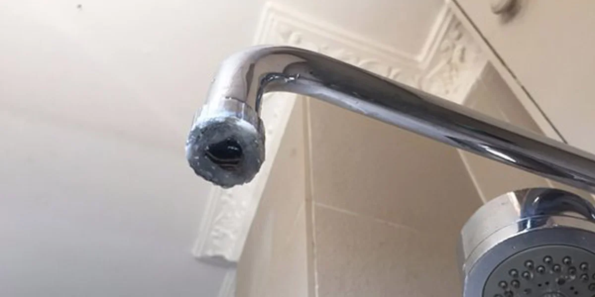 How to Remove A Shower Head That Is Glued On